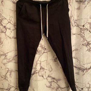 Dip black sweatpants, comfy and cozy.